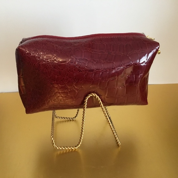 Estee Lauder Handbags - ESTEE LAUDER Croc embossed wine color makeup bag
